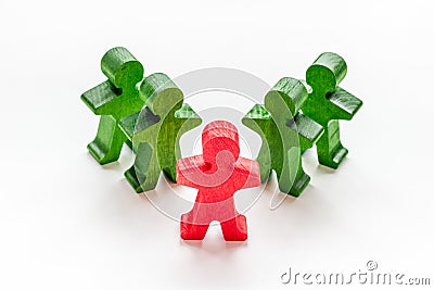 A wooden human red figure stands out from the crowd. Leadership, team building, business succes concept Stock Photo