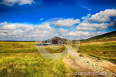 Wooden hut in Moss in Giant mountains in National park in Czech republic Stock Photo