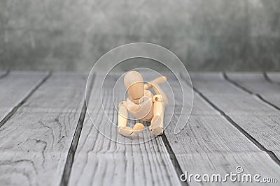 Wooden illustration model figure on a wooden plank surface Cartoon Illustration