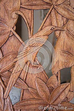 Wooden inlay of a stylized bird Stock Photo