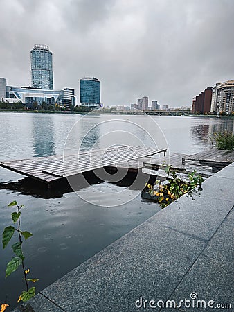 Wooden jetty on a rainy autumn day, Yekaterinburg, Russia Editorial Stock Photo