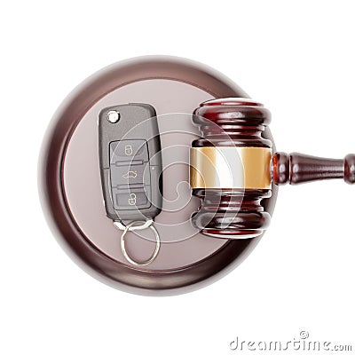 Wooden judge gavel and car keys over sound box - view from top Stock Photo