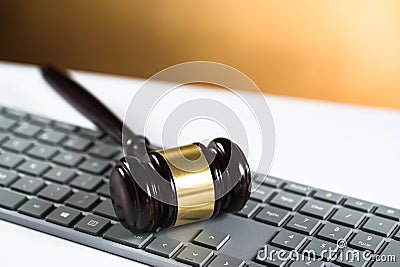 Wooden judge`s gavel. The criminal law Editorial Stock Photo