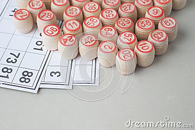 Wooden kegs and cards for a lotto, closeup. Stock Photo