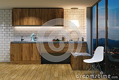 Wooden kitchen furniture in modern interior. Evening view from b Stock Photo