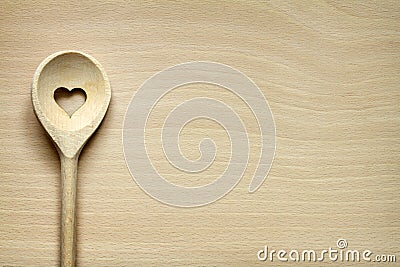 Wooden kitchenware on cutting board Stock Photo