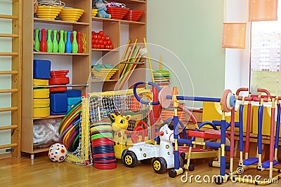 Wooden ladder and children trainers in gymnasium hall. Stock Photo