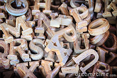 Wooden letters of the English alphabet for sale in the wood shop Stock Photo