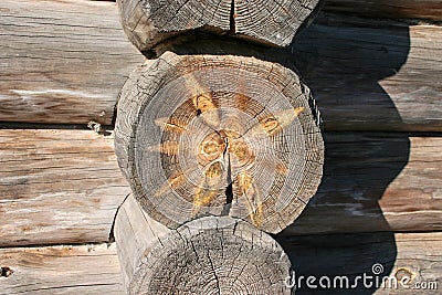 Decorative texture cut of an old tree in the construction of an ethnic w Stock Photo