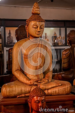 Wooden carved Buddha statue , srilanka Stock Photo