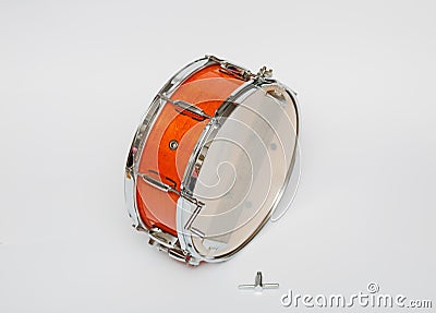 wooden mahogany color snare drum isolated on light grey background Stock Photo