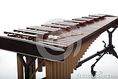 A brown wooden marimba on a white background Stock Photo