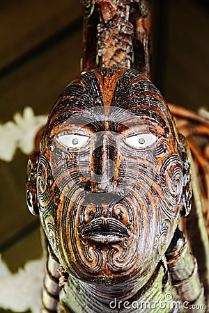 Wooden mask with intricate patterns. Rotorua, New Zealand Editorial Stock Photo