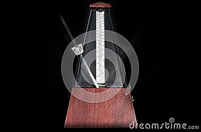 Wooden metronome Stock Photo