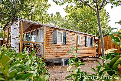 A wooden mobilhome as usual living in a summer campsite Stock Photo