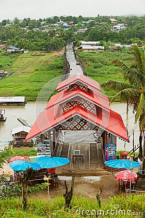 Wooden Mon Bridge across Song Kalia river in Sangkhlaburi, Thailand. Editorial Stock Photo