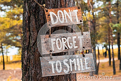 A wooden motivating sign - Donâ€™t forget to smile Cartoon Illustration