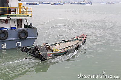 Wooden motor boat sailed out of songgu ferry terminal Editorial Stock Photo