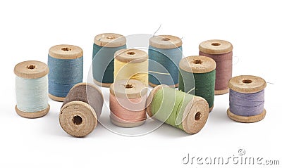 Wooden multicolored thread coils Stock Photo