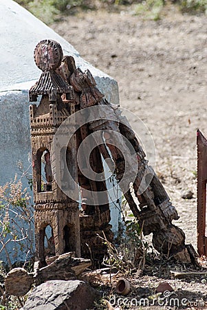 Wooden objects at the entrance to a village for the memory of dead persons Editorial Stock Photo
