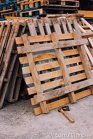 Wooden pallet and adze Stock Photo