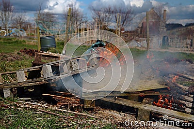Wooden pallets and general rubbish being burned Stock Photo
