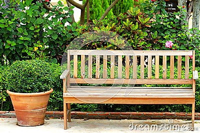 Wooden park bench Stock Photo