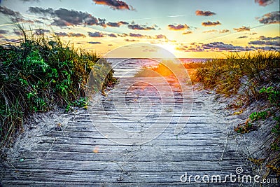 Wooden path at sunset Stock Photo