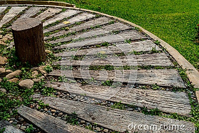Wooden Pathway in garden Stock Photo