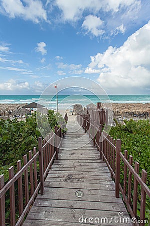 Wooden pathway to the beach in Cayo Santa Maria, Cuba Stock Photo