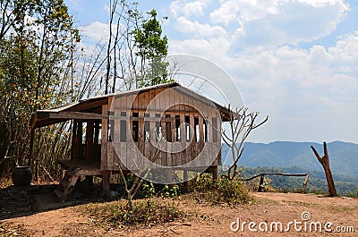 Wooden pavilion house or wood pavillion home at rest point between journey to Ban Taphoen Khi Karen Village on top Khao Thewada Editorial Stock Photo