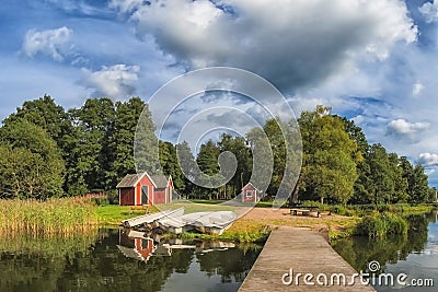 Wooden peer and scandinavian style houses Stock Photo