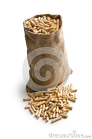 Wooden pellets in jute sack Stock Photo