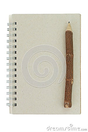 Wooden pencil and recycled notebook Stock Photo