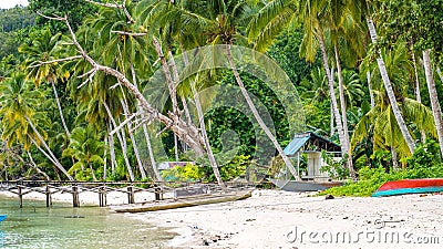 Wooden Pier of an local Village on Gam Island, West Papuan, Raja Ampat, Indonesia Stock Photo