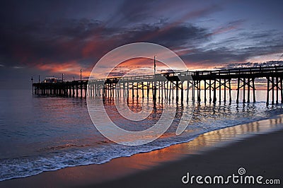 Wooden pier at sunset Stock Photo