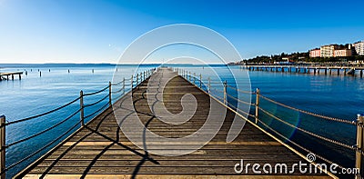 Wooden pier in touristic resort Portoroz - Slovenia. Editorial Stock Photo