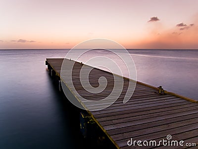 Wooden pier at twilight Stock Photo