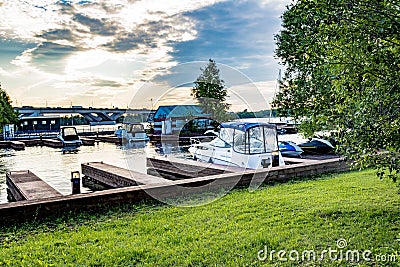 wooden Pier with yachts preitum ticket office on the banks of the Moscow River Stock Photo