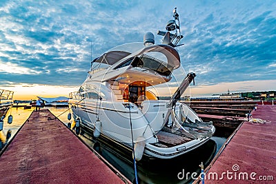 Wooden Pier with yachts preitum ticket office on the banks of the Moscow River Editorial Stock Photo