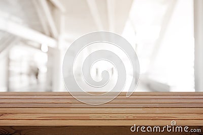 Wooden pine table on top over blur background, can be used mock up for montage products display or design layout Stock Photo