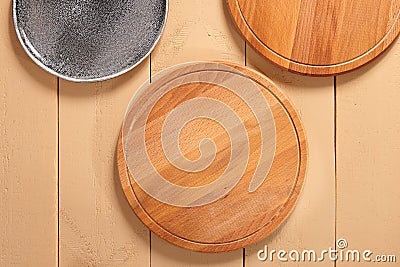 Wooden pizza boards and gray ceramic plate top view Stock Photo