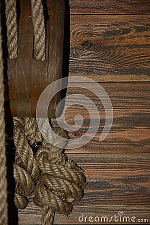 Wooden plank with sailor knot and space for words Stock Photo
