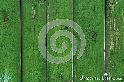 Wooden planks of green color on the fence as an abstract background Stock Photo