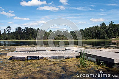 A wooden pontoon pier on a forest lake, Marinette County, Wisconsin Stock Photo