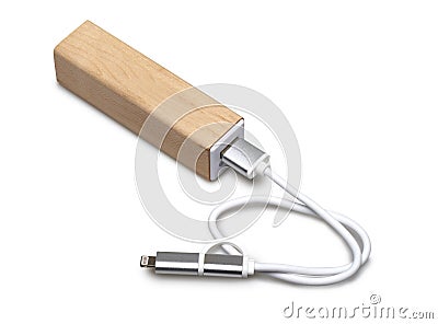 Wooden portable external power bank, for emergency phone recharge. Stock Photo