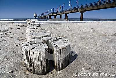 Wooden posts and pier in Prerow on the German Baltic Sea Stock Photo