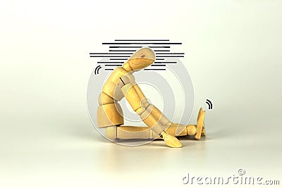 The wooden puppet shows depression, lack of motivation, and discouragement. Stock Photo