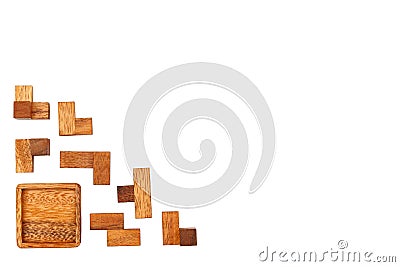A wooden puzzle is a cube. Isolated on white background. Close-up Stock Photo