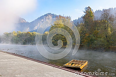 Wooden raft on Dunajec River in Sromowce Nizne in the morning Stock Photo